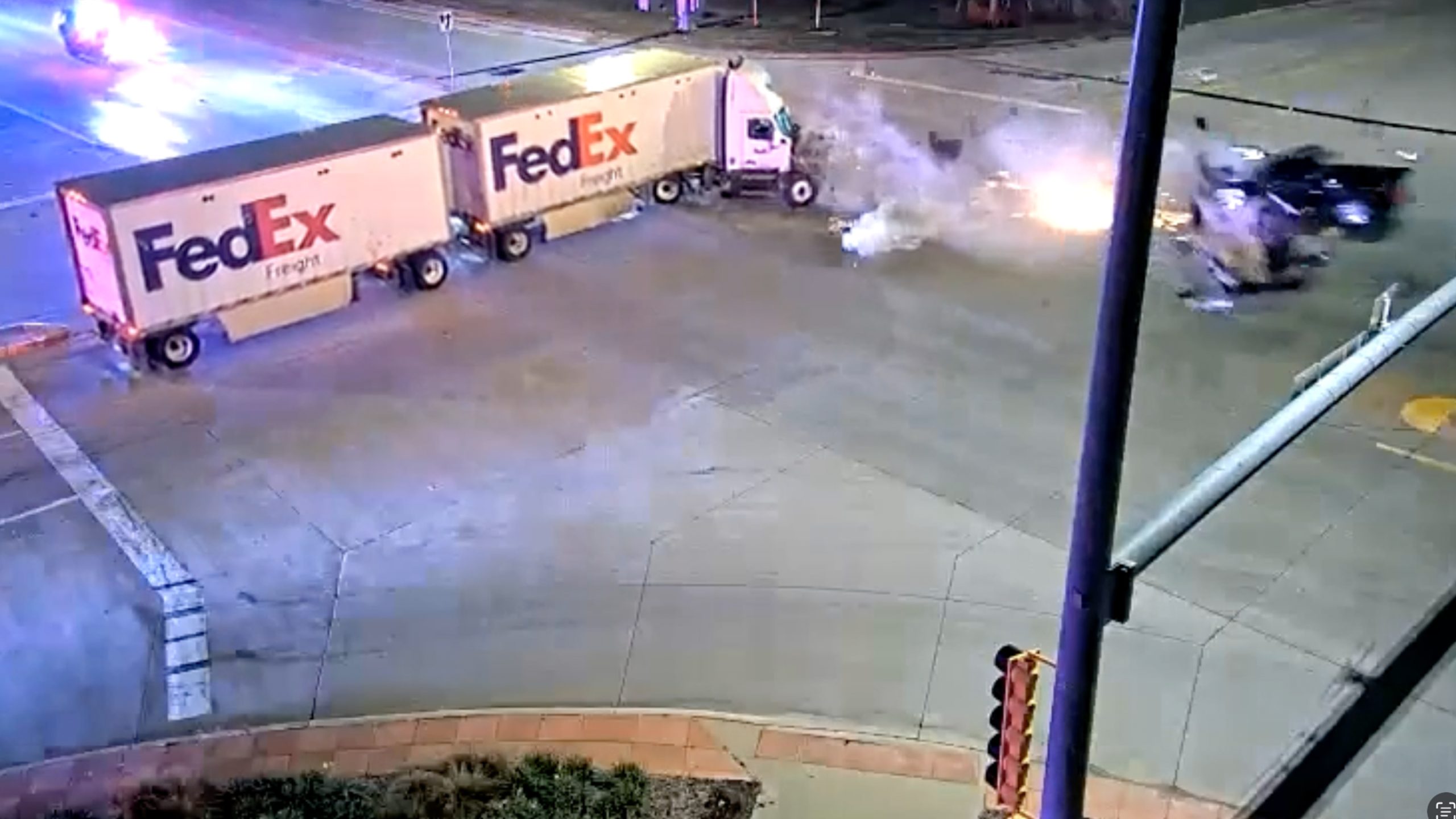 Watch: Suspect fleeing from police crashes into FedEx semi-truck — Woodstock Community news